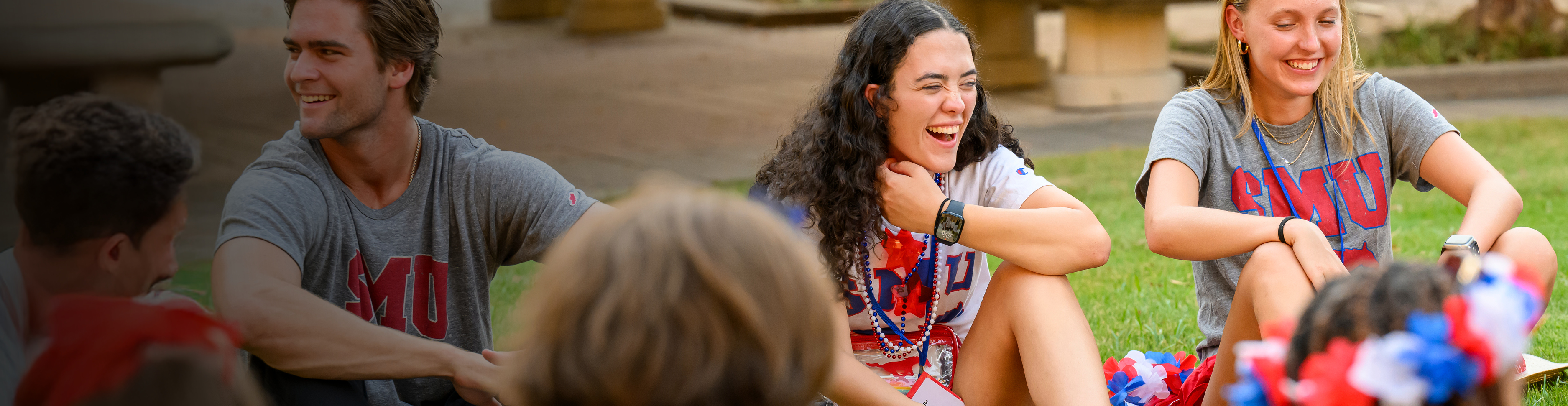 Students sitting on the quad.