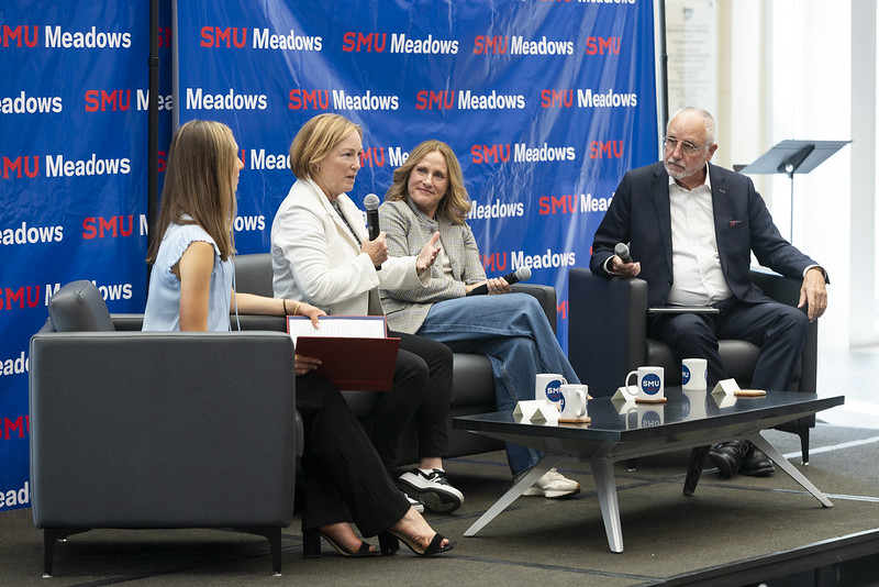 Two alumni lead a Coffee and Conversations event on stage for Meadows students