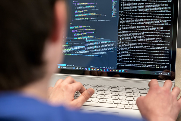 Lyle student typing on laptop