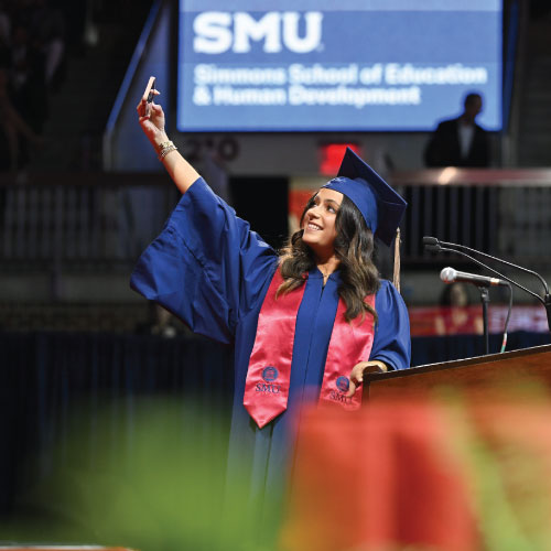 SMU graduates taking a selfie - SMU Alumni